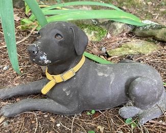 Resin lounging black dog lawn ornament