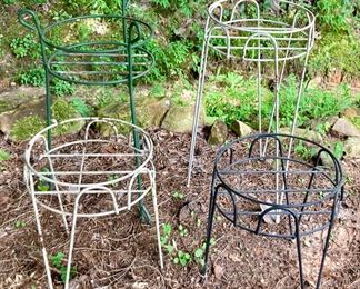 Assorted painted metal plant stands
