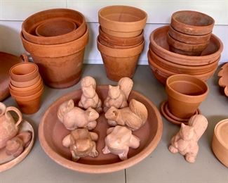 Assorted terra cotta pots, vases, birds, bowls, candlestick holders, votive candle holders, teapots, squirrels, frogs