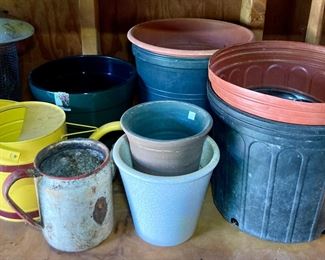 Assorted pots, buckets, watering cans