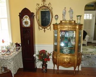 Grandmother case clock and curio cabinet