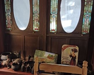 Ornate windows. Probably sidelights originally.