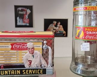 A Straw dispenser and a nice tin