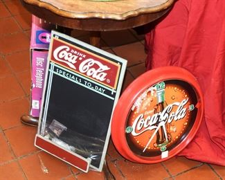 Nice clock and a nice (new) Coca Cola board