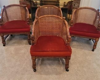 (4) Mid Century Caned Barrel Back Dining Chairs on
Casters