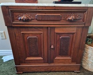 Eastlake era cabinet with marble top
