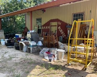 so much stuff.....dog crates, leashes, outdoor equipment, truck tires, etc