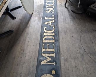 One half of the original Wayne County Medical Society sign. The Whitney was home to this group in 1941.