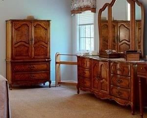 Master bedroom triple dresser, One of the pair of armoires.  By Stanley  NOTICE: THIS SET IS ONE OF THE SELECT PIECES OF  FURNITURE THAT WILL BE AVAILABLE TO VIEW AND PURCHASE PRIOR TO THE OPENING OF THE SALE.   NO ANTIQUES OR COLLECTIBLES WILL BE PRE-SOLD-BUT THE LARGE ITEMS DESIGNATED WITH THIS MESSAGE ARE.  JUST MESSAGE ME FOR AN APPOINTMENT. 