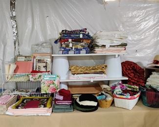 New in the package linens, nice selection of scarves, gloves more