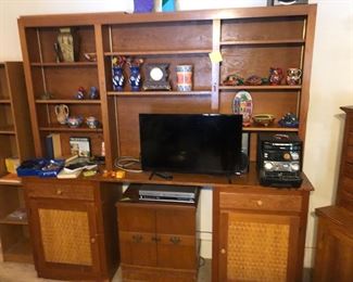 Hand crafted wall unit 84 “wide x 19 deep x 84”tall.  Separate TV stand sitting underneath