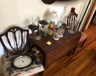 Shield chairs - 8 total. Go with dining table. Miscellaneous items sold separately.  Drop leaf table opens to 48 “ , 41 wide x 29 high