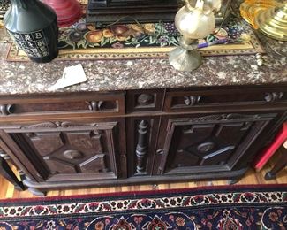 Marble top buffet c 1880-1890. 55” wide x 23 deep x 38 tall
