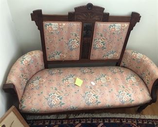 1930-1940 Eastlake love seat. 48” seating area