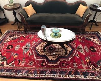 Oval coffee table with Italian marble top. 33x21 x 18 high. Rug is 6 x 12. Green sofa c 1920’s -30’s. 65 “ seating area