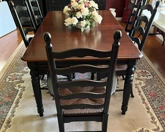 #4	American Drew Table w/black Legs & Wood top w/2 leaves and  w/6 ladder back chairs/rushing seats 69-101x42x30  	 $275.00 																																																																																																																																																																																																																																																																																																																																																																																																																																																																																																																																																																																																																																																																																																																																																																																																																																																																																																												