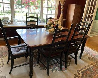 #4	American Drew Table w/black Legs & Wood top w/2 leaves and  w/6 ladder back chairs/rushing seats 69-101x42x30  	 $275.00 																																																																																																																																																																																																																																																																																																																																																																																																																																																																																																																																																																																																																																																																																																																																																																																																																																																																																																												