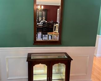 #17	Pulaski Lighted (from bottom) glass shelf Display Cabinet w/mirror - 30x14x29  Mirror 22x32	 $175.00 																																																																																																																																																																																																																																																																																																																																																																																																																																																																																																																																																																																																																																																																																																																																																																																																																																																																																																																															