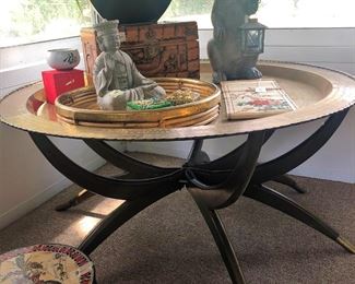 Unique Moroccan brass tray table with spider legs.