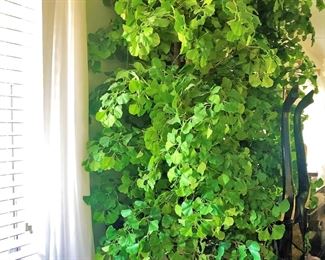 Very tall, realistic, artificial ginkgo tree.