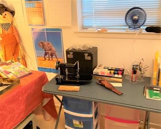 Several older Elephant calendars.  Vintage Singer sewing machine.