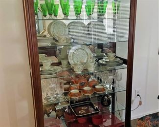 unique front sliding glass, lighted curio cabinet
