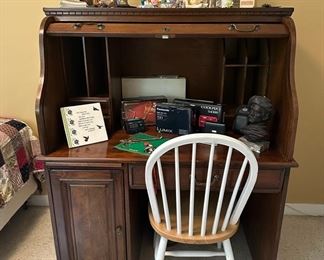 The Lumix and Coolpix cameras on the desk are sold.