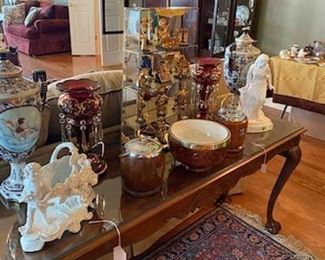 Some of the finer pieces are pictured separately. There are too many. These wider shots are to show the larger collection. All are the finest glass, porcelain, and china art objects.