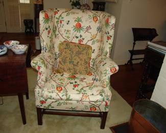 Custom upholstered wing chair by Denaux Interiors
