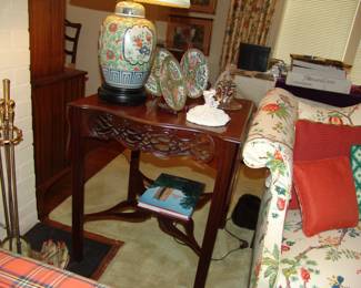 Mahogany side table with oriental lamp