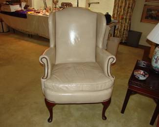 Leather upholstered wing chair