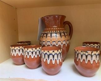 21 piece set of Hand Designed Pottery