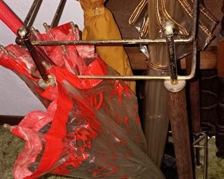 BRASS UMBRELLA STAND AND UMBRELLA'S