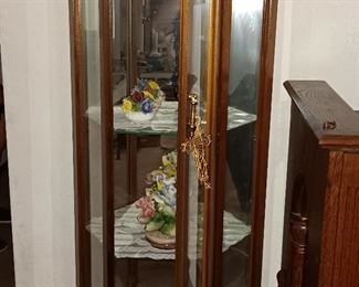 CAPODIMONTE  FLOWERS INSIDE OF CURIO CABINET