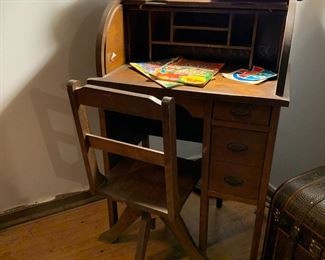 Small child's roll top desk and chair 
