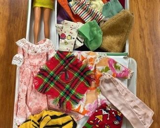 old barbie doll with clothes & case