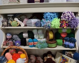 Lots of yarn, knitting, and crafts. Just starting to unpack. There's also notions, patterns, books, and batting.