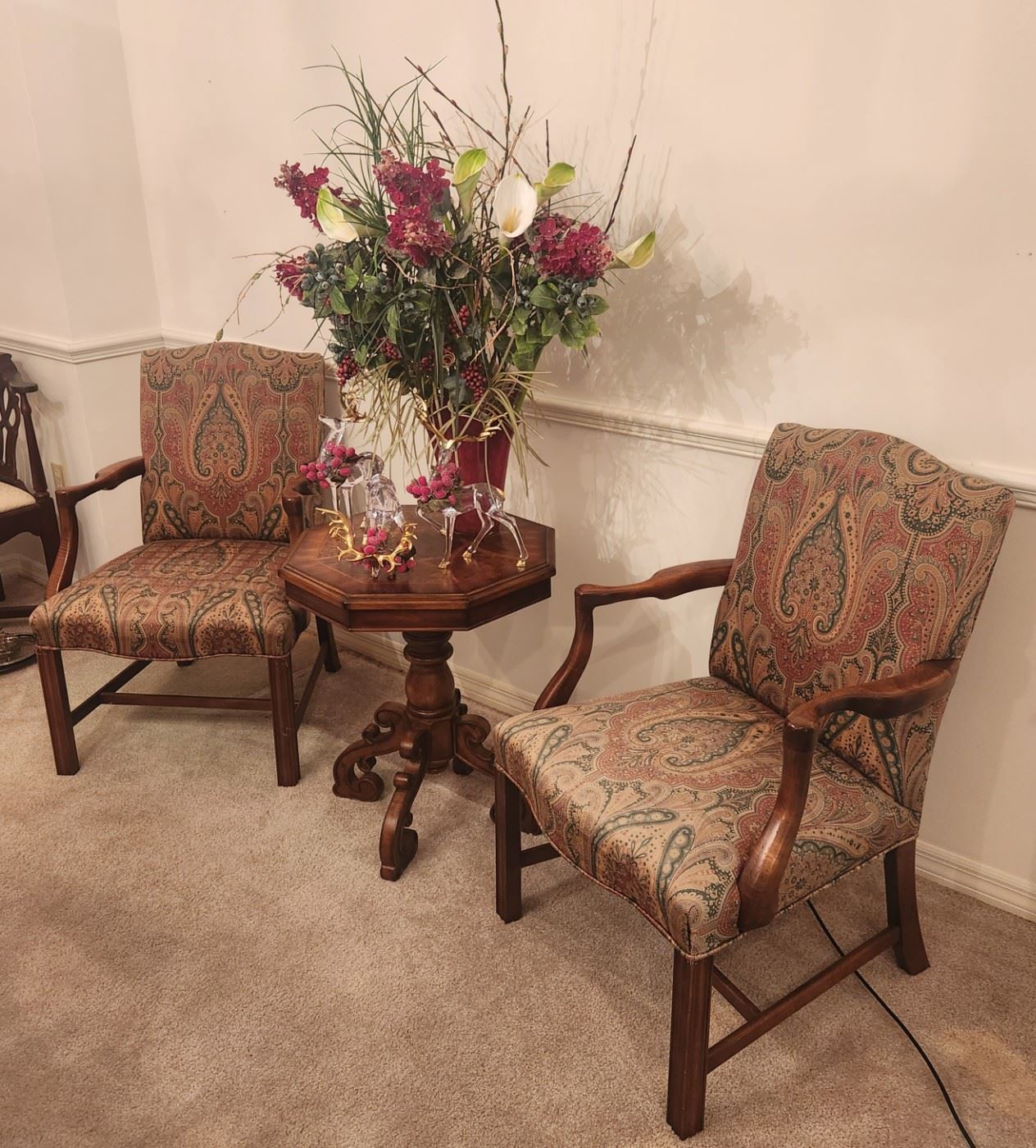 Great side chairs, red art glass vase w/ flower arrangement and crystal deer decor