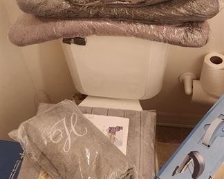 New bathroom accessories, towels, rugs