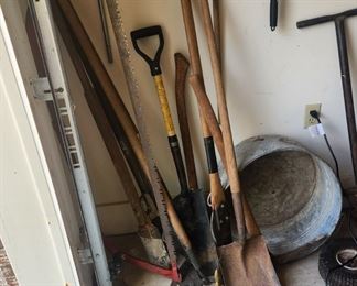 Yard tools and brass andirons 