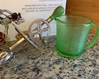 Vintage whisk and measuring cup