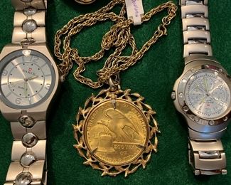 knock-off "Swiss" watches and not-a-gold-coin necklace