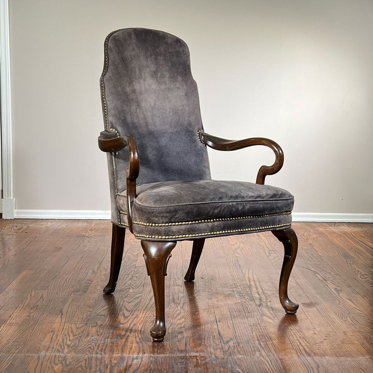 Suede Upholstered Library Chair | Georgian style library chair with curved arms, having greenish gray suede and brass tacks. -  l. 27 x w. 27 x h. 43 in
