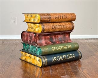 Book Side Table | 20th century painted tin storage box / side table in the form of vintage books; top book cover can be opened to reveal storage space inside. -  l. 18 x w. 16 x h. 18 in