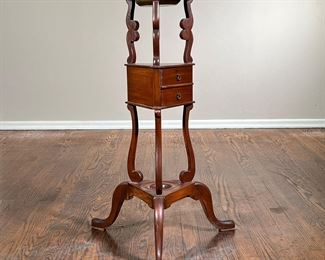 Georgian Style Plant Stand | Schott Furniture wig stand or plant stand, having a copper insert, scroll supports with two open work shelves and two triangular pullout drawers, resting on cabriole legs. - l. 21 x w. 18 x h. 33 in