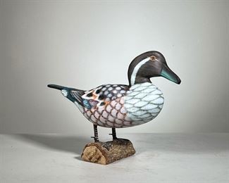 Painted Wood Duck | Polychrome wood duck mounted to a small log; glass eyes intact; no apparent signature. - l. 13 x h. 9 in 