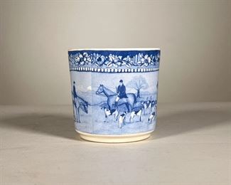 Ralph Lauren Cup | A small blue and white cup by Ralph Lauren featuring men on horseback and dogs preparing for a fox hunt. - h. 3.25 x dia. 3.25 in