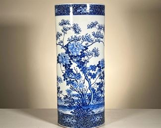 Blue & White Umbrella Stand | Tall porcelain umbrella stand with blue & white underglaze motif of flowering branches. - h. 24.5 x dia. 10 in