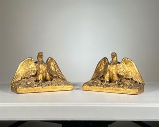 Pair Eagle Bookends | Gilt carved wood eagle bookends with federal shield backs. - l. 9 x w. 3.5 x h. 6 in