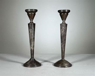 Pair Sterling Candlesticks | A pair of sterling cement-filled candlestick, numbered "810" on the bottoms . - h. 10 in